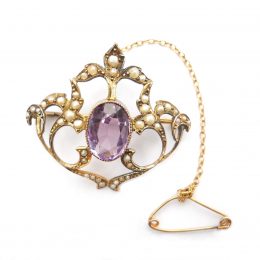 Victorian amethyst and seed pearl 9ct gold foliate brooch