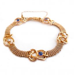Edwardian Art Nouveau sapphire and pearl set 9ct gold knot bracelet