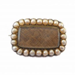 Georgian hair work and pearl inscribed mourning brooch