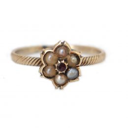 Victorian garnet and seed pearl 9ct gold flower ring