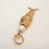 Articulated fish charm with a pearl set to mouth