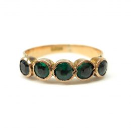 Victorian green paste closed back 15ct gold half hoop ring