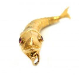 Superb 18ct gold fish with dark pink eyes