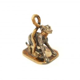 Ear;y 19th century gold and silver whippet charm