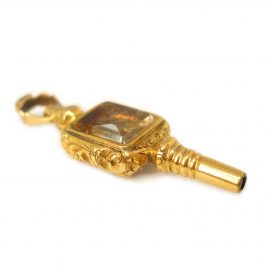 Miniature gold cased watch key