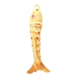 Gold articulated fish with pink eyes