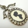 Antique sterling silver and paste bow locket, circa 1900-10