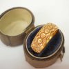Antique Victorian floral motif embossed 18ct gold band