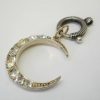 Antique silver paste crescent pendant on a niello bolt ring