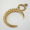 Victorian 15ct gold seed pearl crescent pendant on a 9ct gold bolt ring, both circa 1890