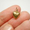 Tiny vintage 9ct gold puffy heart charm